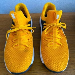NIKE free running shoe Black and Yellow